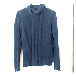 Blue cable knit turtleneck sweater